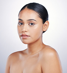 Image showing Woman, face and beauty with makeup in portrait, natural cosmetics and skincare isolated on studio background. Female model from Mexico, skin glow with health and shine, cosmetic care and dermatology