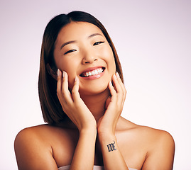 Image showing Smile, face and skincare portrait of Asian woman in studio isolated on a white background. Natural, beauty and female model with makeup, cosmetics hairstyle or spa facial treatment for healthy skin.