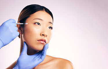 Image showing Face injection, skincare and Asian woman with plastic surgery in studio isolated on white background mockup space. Cosmetics, syringe and model with dermal filler for dermatology, facelift or beauty