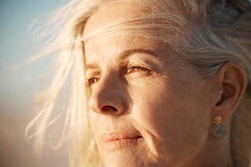 Image showing Face, thinking and a mature woman outdoor in wind for freedom, memory or travel in summer. Headshot and beauty of serious female person in nature for air, retirement vision and holiday or vacation