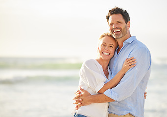 Image showing Happy couple hug on beach, love and travel with anniversary vacation, tourism and mockup space. Happiness, trust and commitment with man and woman on tropical holiday, ocean and affection outdoor