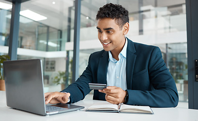 Image showing Credit card, businessman and laptop with online banking, payment and ecommerce store. Computer, male professional and smile of a corporate worker with web shopping on an internet retail shop at work