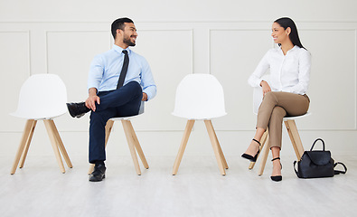 Image showing Discussion, chair and business people waiting for interview, job vacancy and opportunity in office. Corporate workplace, recruitment and man and woman talking, speaking and in conversation for hiring