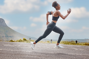 Image showing Athlete, wellness and fast woman running and training for outdoor sports, workout and exercise for a marathon. Strong, fitness and healthy female person or runner with speed, sprint and health