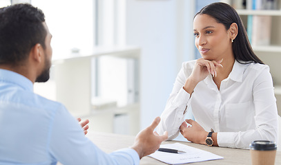 Image showing Meeting, hiring and business people in discussion for interview, job vacancy or opportunity in office. Corporate, recruitment and man and woman in conversation for hiring with CV or resume documents