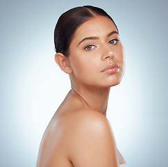 Image showing Serious face, skincare and woman in studio isolated on a white background. Portrait, natural beauty or female model in makeup, cosmetics or spa facial treatment for skin health, aesthetic or wellness