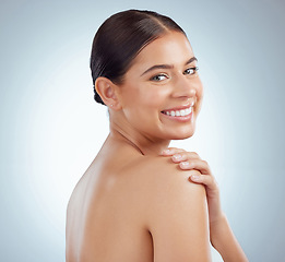 Image showing Face, beauty skincare and smile of woman in studio isolated on a white background. Portrait, natural and female model in makeup, cosmetics or facial treatment for skin health, aesthetic or wellness.