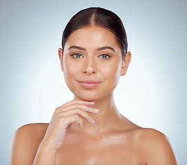 Image showing Face, beauty skincare and confident woman in studio isolated on a white background. Portrait, natural and female model in makeup, cosmetics or facial treatment for skin health, aesthetic or wellness.