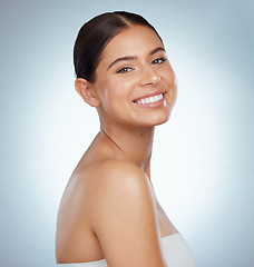 Image showing Face, skincare and happy woman in studio isolated on a white background. Portrait, natural beauty and female model in makeup, cosmetics or spa facial treatment for skin health, aesthetic or wellness.