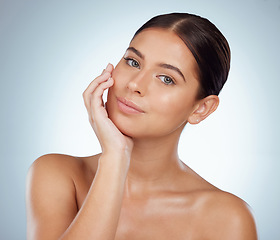 Image showing Face, skincare and beauty of confident woman in studio isolated on white background. Portrait, natural and female model in makeup, cosmetics or facial treatment for skin health, aesthetic or wellness