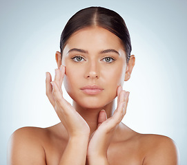 Image showing Serious face, skincare and beauty of woman in studio isolated on a white background. Portrait, natural and female model in makeup, cosmetics or facial treatment for skin health, aesthetic or wellness