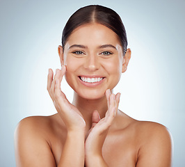 Image showing Face, skincare and beauty of happy woman in studio isolated on a white background. Portrait, natural and female model in makeup, cosmetics or facial treatment for skin health, aesthetic or wellness.