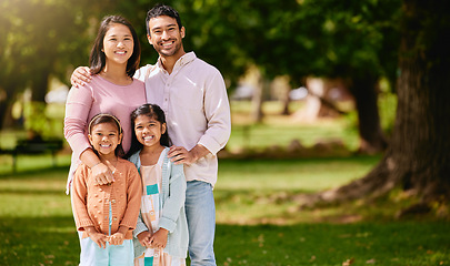 Image showing Portrait of happy family, park and parents with kids, mockup and bonding time in nature together with smile. Mother, father and children on grass field for fun outdoor adventure in summer garden.