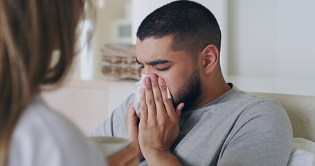 Image showing Blowing nose, virus and worry with couple in bedroom for sickness, healthcare and illness. Problem, fatigue and care with man and woman in bed at home for sneeze, fever and wellbeing treatment