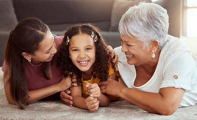 Image showing Happy, generations and relax with family on floor of living room for bonding, smile and love. Happiness, trust and grandmother with young child and mom at home for solidarity, support and weekend