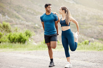 Image showing Stretching legs, warmup and couple of friends in the mountain for outdoor exercise. Training, wellness balance and young people smile with leg stretch for fitness run, sports and workout on a road