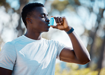 Image showing Man, outdoor and asthma inhaler to breathe with allergies, asma or lungs problem while running. Black male runner with emergency medicine pump for health and breathing in a spring forest in nature