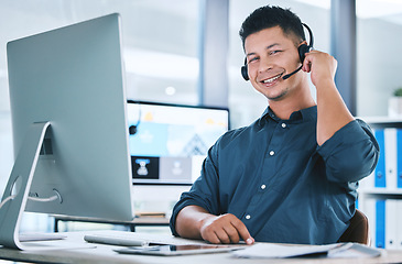 Image showing Call center, customer service and portrait of a man at a computer with a headset for contact us communication. Crm, telemarketing and sales or happy technical support agent or consultant person at pc