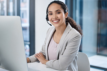 Image showing Call center, consultant woman and pc with smile in office for customer service, tech support and IT advice with voip. Crm, telemarketing or agent in portrait with microphone, consulting and help desk