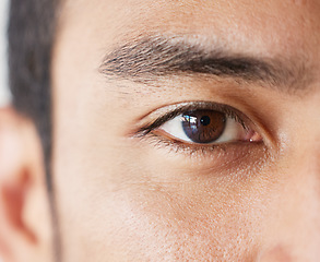 Image showing Vision, eye and portrait of man closeup, thinking and ideas for startup business with focus and commitment. Motivation, dedication and zoom on eyes of young businessman with calm expression and idea.