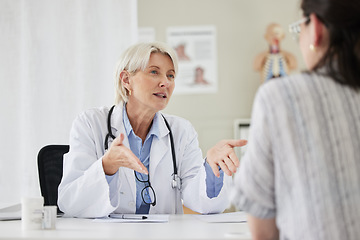 Image showing Senior, doctor and patient for consultation at the clinic about health condition and wellness. Medical, professional and women with communication at hospital in the office about medicine and surgery.