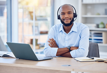 Image showing Black man, portrait and callcenter with arms crossed and contact us, communication with headset and CRM. Male consultant with smile, customer service or telemarketing with confidence and help desk