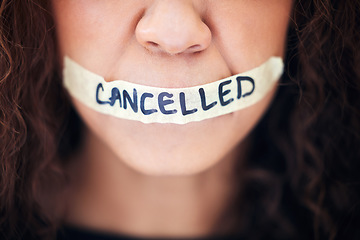 Image showing Political, protest and closeup with tape on a mouth for justice, freedom or revolution movement. Bullying, violence and zoom of a woman with cancelled on lips for feminism, activism or discrimination