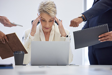 Image showing Headache, burnout and overwhelmed business woman surrounded in busy office with stress, paperwork and laptop. Frustrated, overworked and tired employee with anxiety from deadline time pressure crisis