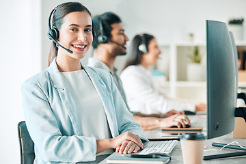 Image showing Young woman, call center and portrait with smile, consulting and customer service with computer in office. Girl, telemarketing agent and pride for job, contact us and happy at tech support help desk