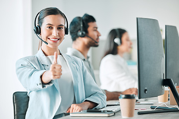 Image showing Young woman, thumbs up and call center portrait with smile for agreement, review or yes for customer service. Girl, telemarketing agent and emoji for deal, success and happy at tech support help desk