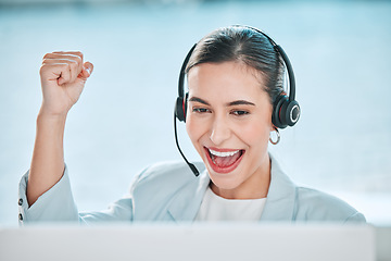 Image showing Woman, call center portrait and celebrate with fist, smile or winning with success, bonus or customer service. Girl, telemarketing agent and winner in tech support, help desk or celebration of profit