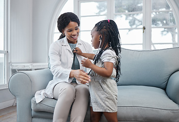 Image showing Doctor, girl and pediatrician woman with stethoscope, medical test and appointment with child on sofa. Healthcare, cardiology and kid listen to heart, breathing and lung health in living room