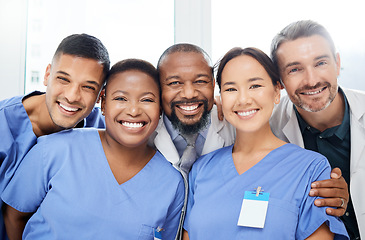 Image showing Medical, portrait of doctors and happy together at hospital or clinic with smile. Diversity, medical team for healthcare and excited or cheerful group of nurse or surgeons smiling for health wellness