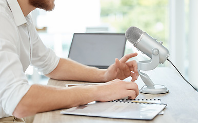 Image showing Podcast, microphone and live streaming person speaking, advice or broadcast on web platform in office. Computer, mic and hands of man with voice talking for news, politics or media report on radio