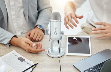 Image showing Podcast, interview and business people hands, microphone and broadcast, talking or news, finance and advice in office. Radio, live streaming and professional person, partner or startup team planning