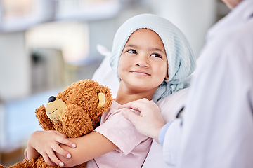 Image showing Cancer patient, child and doctor with support, healthcare service and hand for empathy, love and healing in hospital bed. Happy, sick girl or kid listening to pediatrician or medical person helping