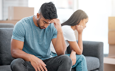 Image showing Couple, fight and break up of man feeling depressed on living room sofa with relationship problem. Divorce talk, cheating anxiety and marriage crisis of young people on lounge couch at home thinking