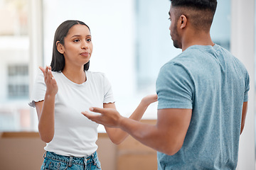 Image showing Stress, argument and couple in new home fighting about marriage crisis, debt conflict and anger. Drama, angry woman and man in frustrated discussion together, anxiety and moving problem.