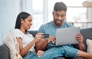 Image showing Online shopping, laptop and credit card, couple on sofa in living room and internet banking in home. Technology, ecommerce payment and happy woman and man browsing retail website or digital shop deal