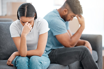 Image showing Couple, marriage fight and woman feeling sad and depressed on living room sofa with relationship problem. Divorce talk, cheating anxiety and crisis of young people on a lounge couch at home thinking