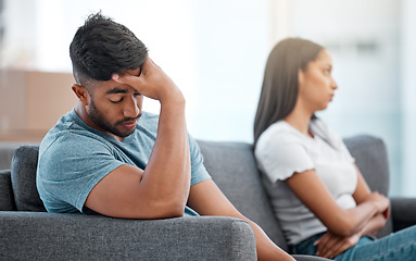 Image showing Couple, fight and frustrated man depressed on living room sofa with relationship problem. Divorce fear, cheating anxiety and marriage crisis of young people on a lounge couch at home thinking