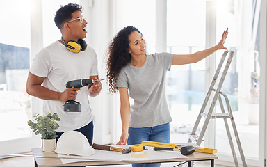 Image showing Maintenance, renovation and planning with a couple in the new home together for a remodeling project. Construction, real estate or property vision with a man and woman bonding over house maintenance