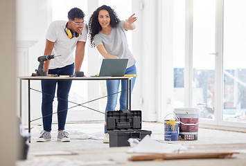 Image showing Laptop, renovation and vision with a couple in their new home together for a remodeling project. Construction, real estate or diy property maintenance with a man and woman planning in their house