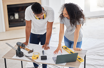 Image showing Maintenance, renovation and diy planning with a couple in their new home together for a remodeling project. Construction, real estate or property blueprint with a man and woman talking in the house