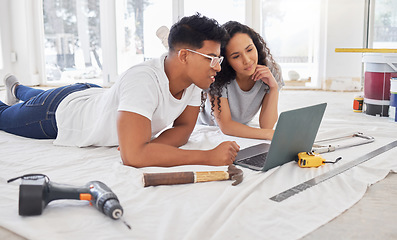 Image showing Laptop, thinking and renovation a couple in their new home together for a remodeling project. Construction, real estate or diy property maintenance with a man and woman planning in their house