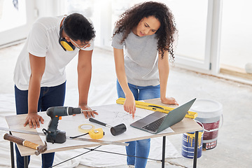 Image showing Maintenance, renovation and blueprint with a couple in their new home together for a remodeling project. Construction, real estate or diy property improvement with a man and woman planning in a house