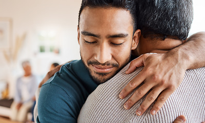 Image showing Father, son and hug for love, care or support in family bonding or time together in living room at home. Happy man hugging dad in reunion embrace, relationship or greeting for elderly care at house