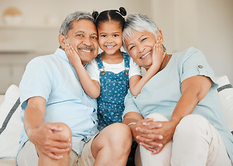 Image showing Love, portrait of grandparents with child smile and on a sofa in living room of their home. Support or care, generations and elderly people with grandchild on smiling couch for bonding time together