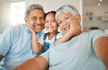 Image showing Selfie, love and grandparents with a girl, family or home with happiness, loving or relax. Portrait, old woman or elderly man with female grandchild, smile or bonding with joy, retirement or vacation