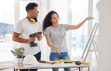 Image showing Maintenance, planning and diy with a couple in their new house together for a remodeling project. Construction, real estate or property renovation with a man and woman bonding over home improvement